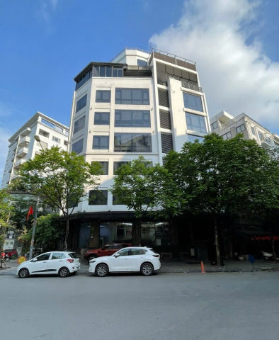 Cho Thuê Tòa Văn Phòng 9 tầng MP Dịch Vọng Hậu. Lô Góc DT 157m2 MT 30m. Giá 230 Tr/th